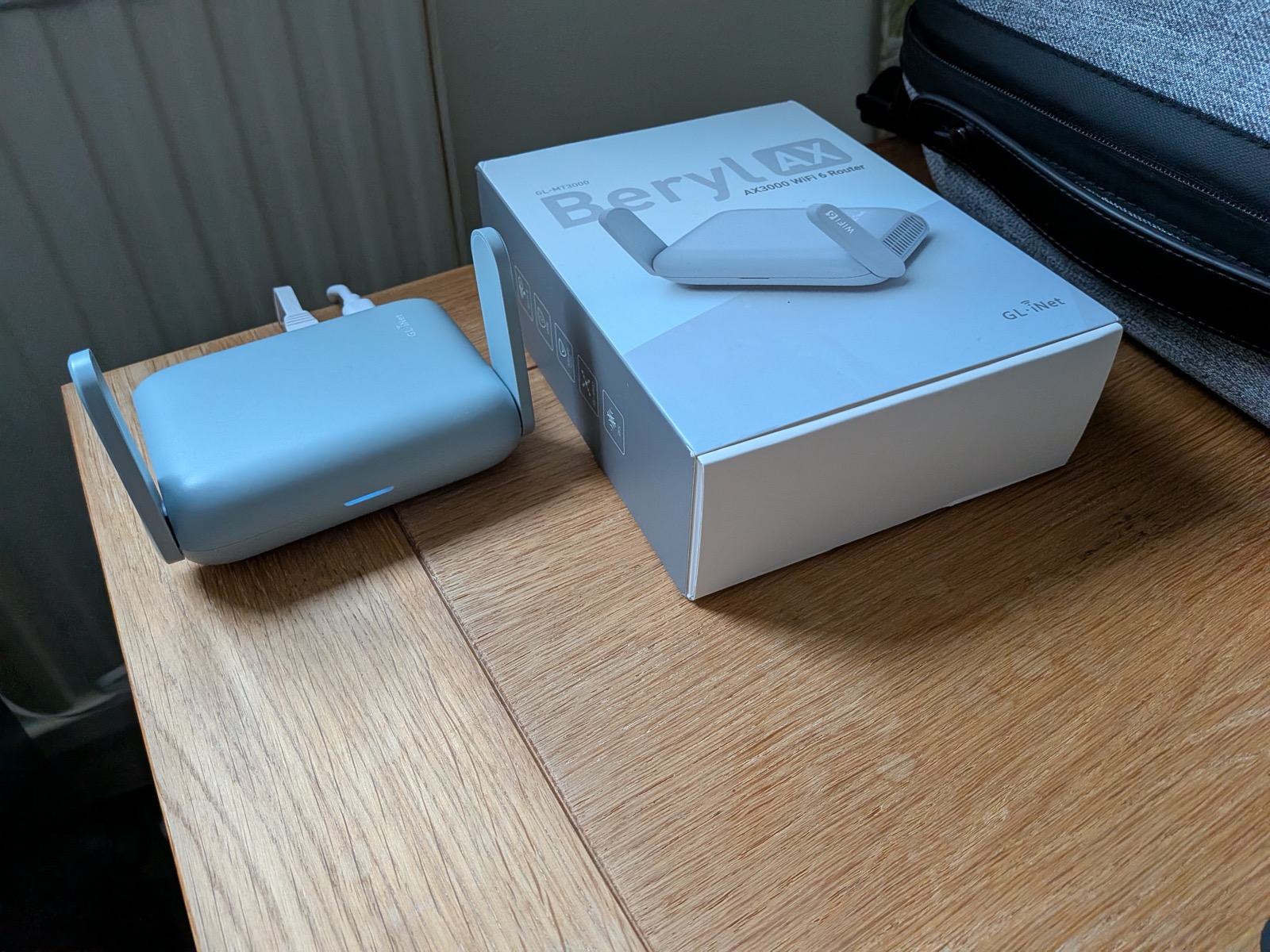 GL.iNet Beryl AX (GL-MT3000) router and box